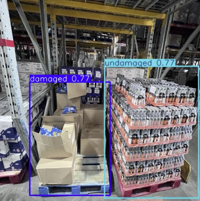Detector output on a warehouse photo, with boxes labelled damaged and undamaged